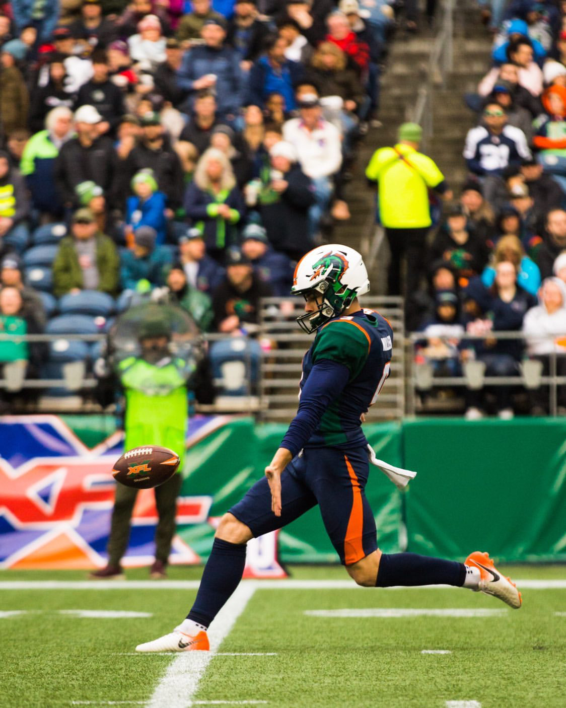 Brock Miller punting for the Seattle Dragons